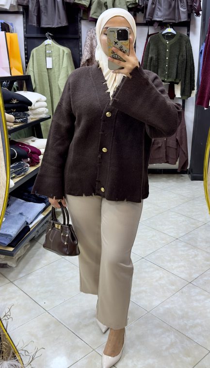 Gilet en lain déchiré